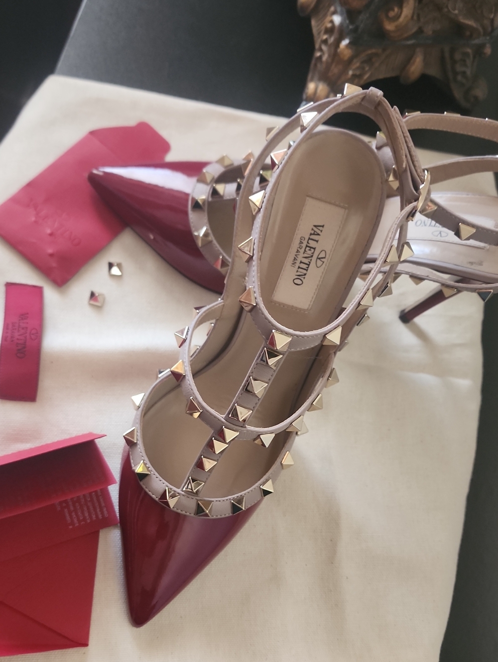 Valentino Garavani Red Patent Leather Rockstud T-Strap Pumps with Nude Straps
